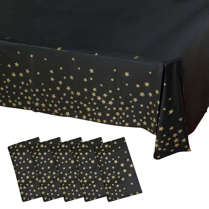 5 Pack Black Rectangle Plastic Table Covers with Gold Stars, 54"x108" PVC Waterproof Disposable Tablecloths - Pro Linens