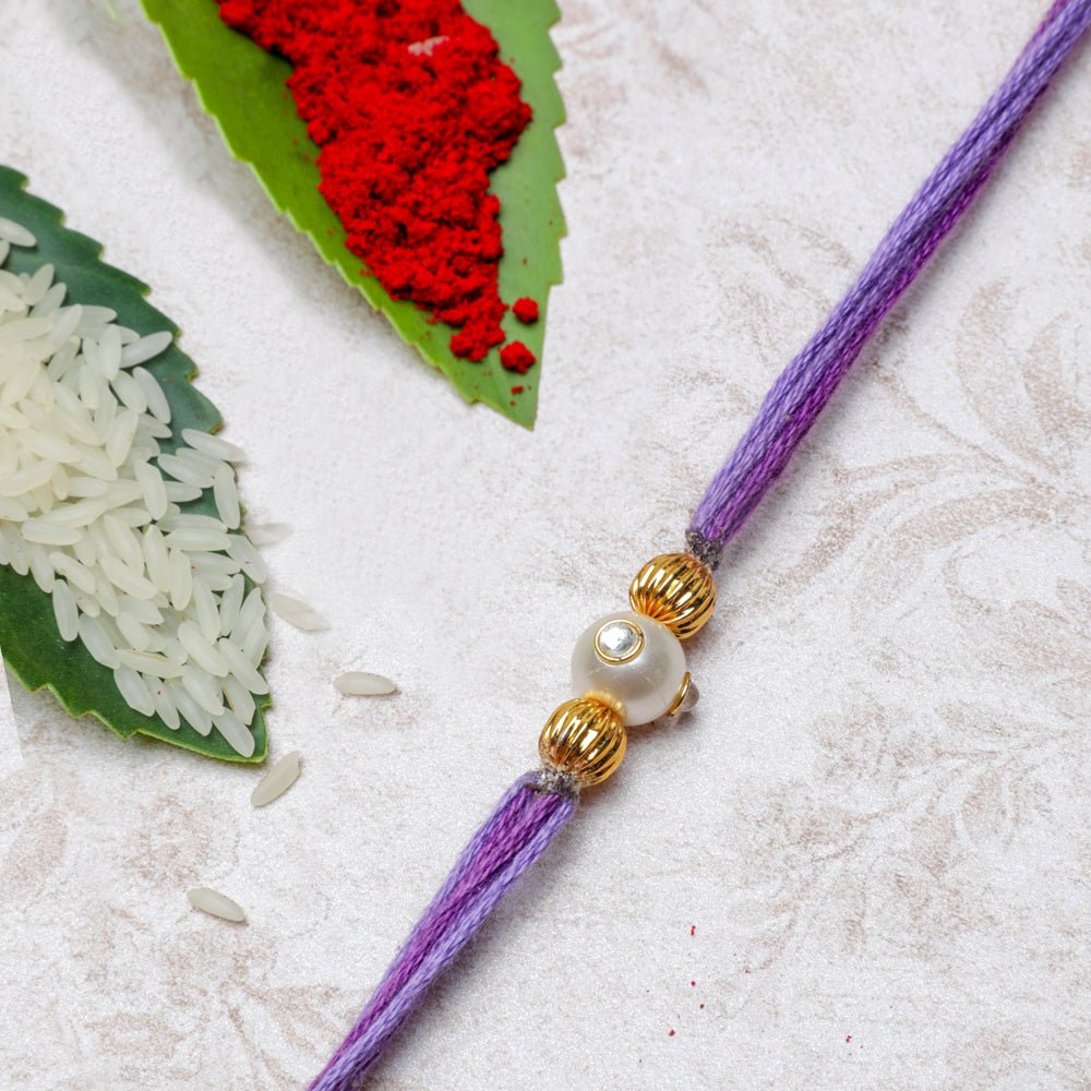 Handmade Pastel Purple Rakhi Thread With Pearl and Gold Beads rakhi PRO Indian